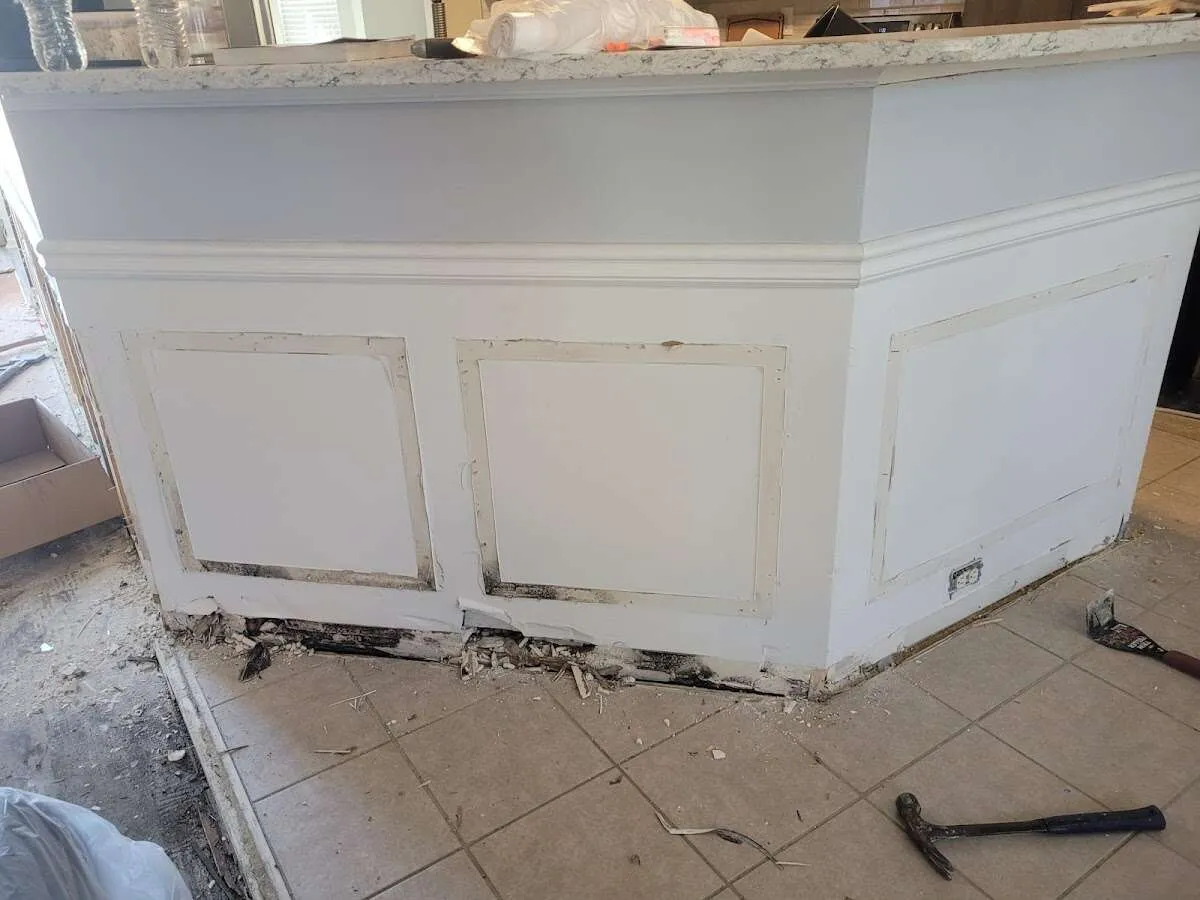 Water damage and mold on kitchen during Sewage Cleanup & Sanitation in Grant-Valkaria